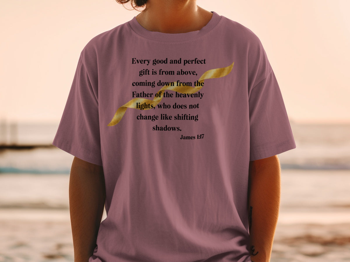 Mauve t-shirt with James 1:17 Bible verse and golden ribbon graphic.