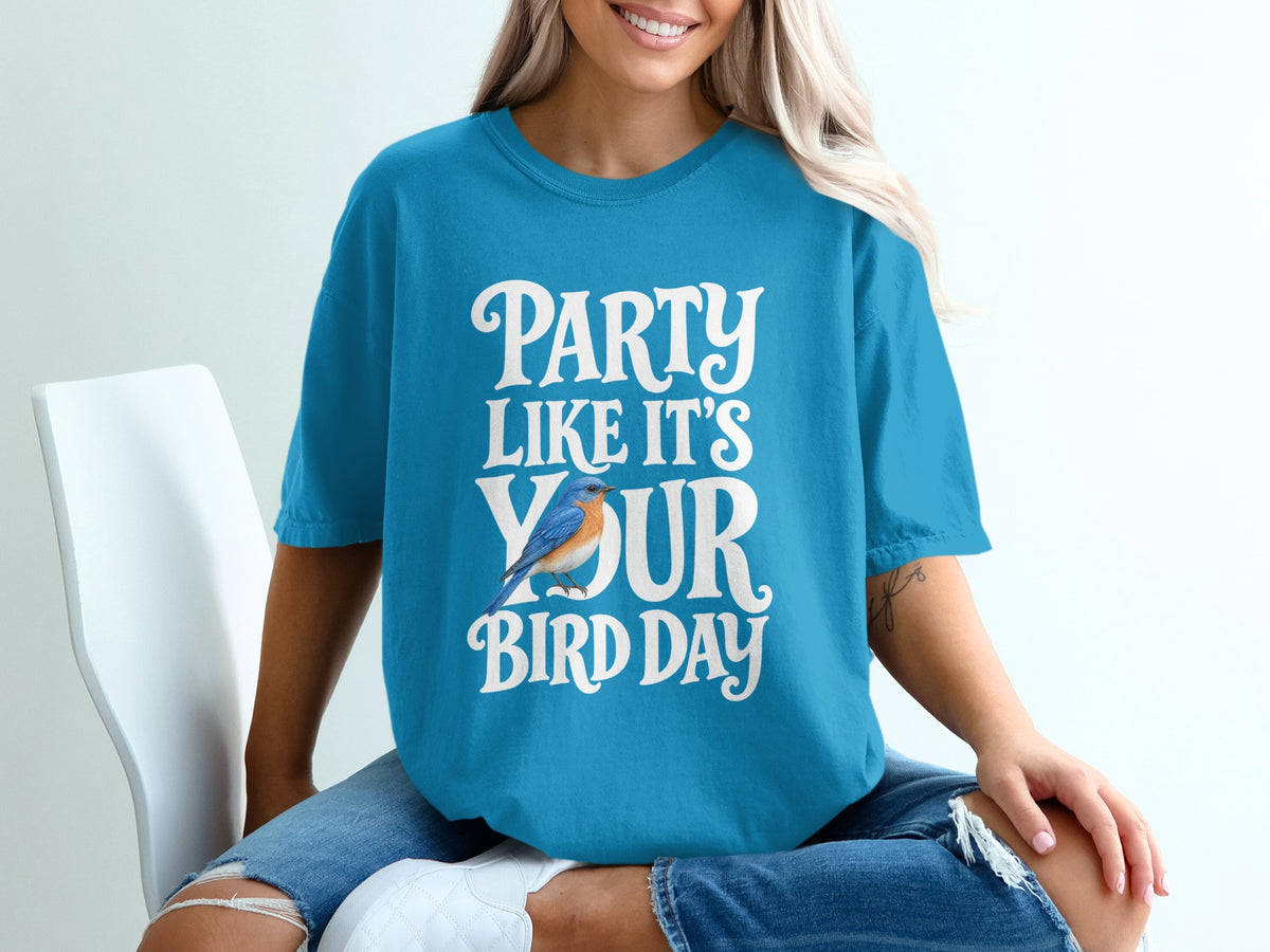 Blue t-shirt with white text "PARTY LIKE IT'S YOUR BIRD DAY" and a bluebird.