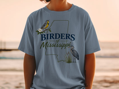 Blue t-shirt with Mississippi outline, text and illustrations of birds.