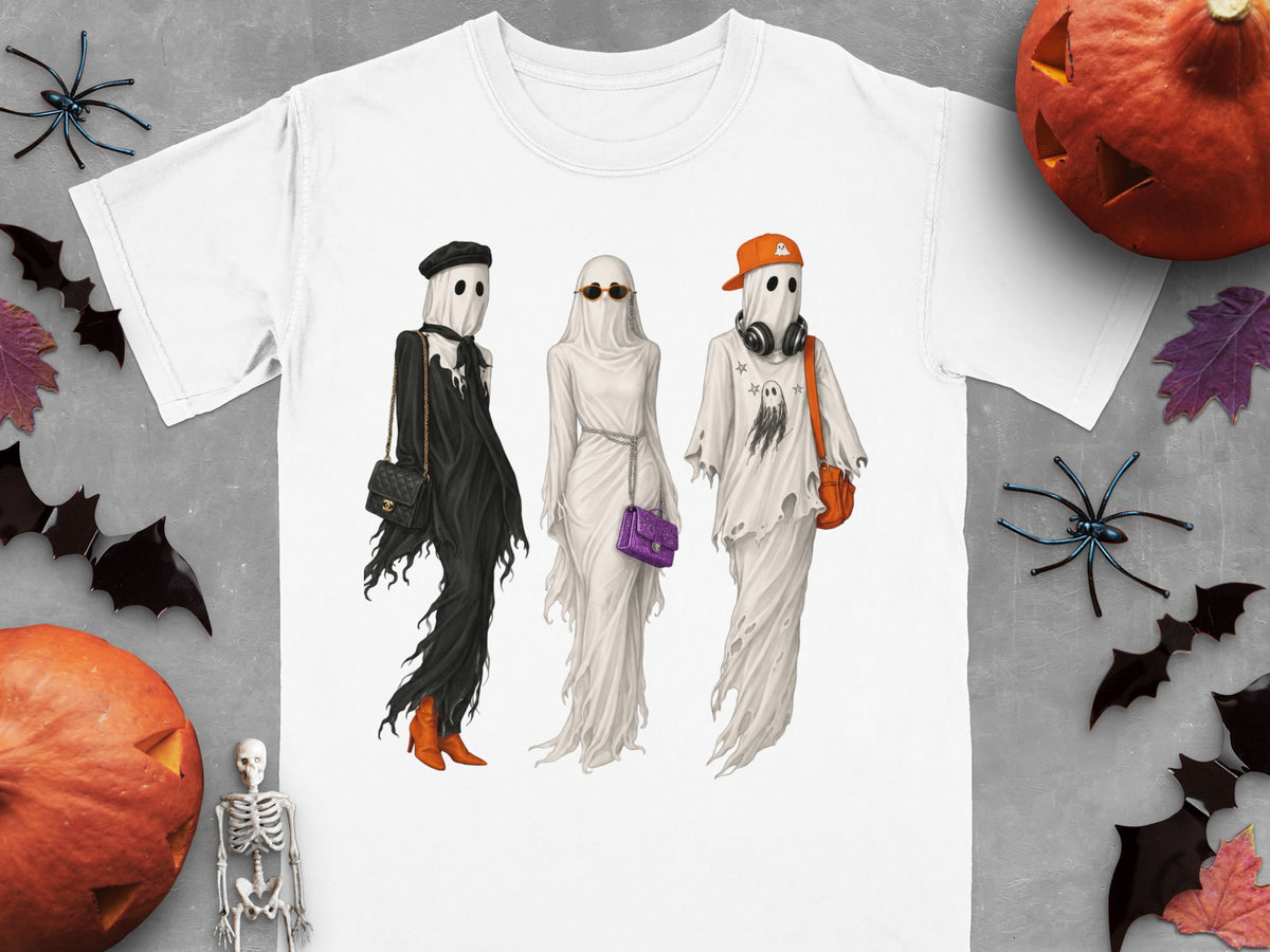 White t-shirt graphic features three fashionably dressed ghosts for Halloween.