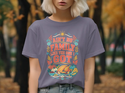Purple t-shirt with text "Ain't No Family Like The One I Got" and Thanksgiving graphics.