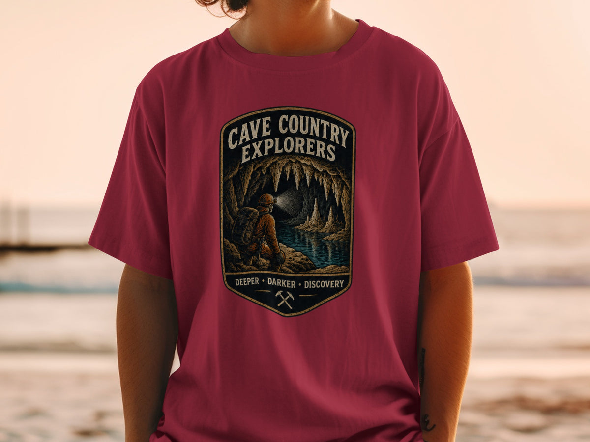 Cave Country Explorers design with caver and quote "Deeper Darker Discovery".