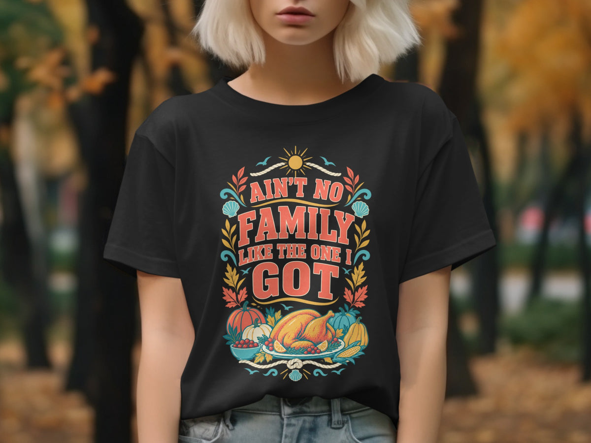 Black t-shirt with "Ain't No Family Like The One I Got" text and Thanksgiving food.