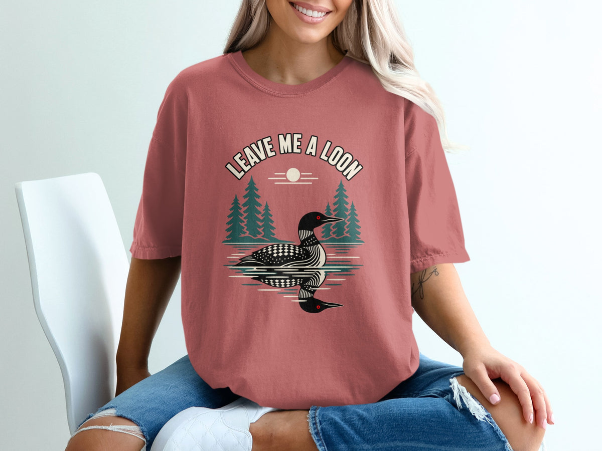 T-shirt with a loon graphic and text "LEAVE ME A LOON"