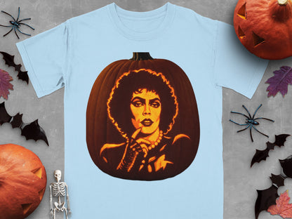 Light blue t-shirt featuring a carved pumpkin graphic of Frank-N-Furter, surrounded by Halloween decorations on gray background.