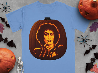 A light blue t-shirt printed with a carved pumpkin design of Frank-N-Furter, surrounded by Halloween decorations.