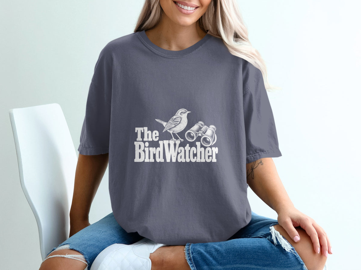 Gray t-shirt with white text and graphic of a bird and binoculars.