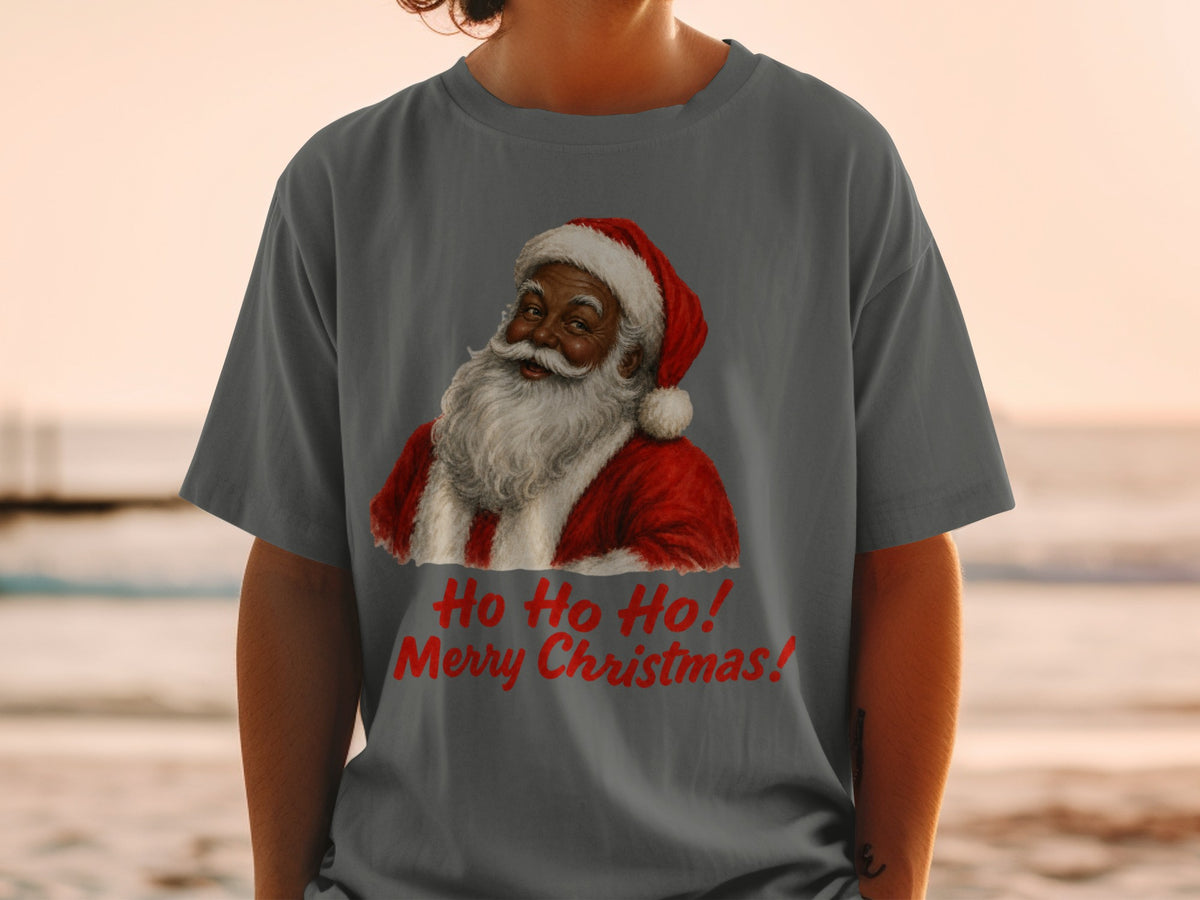 Santa Claus graphic with "Ho Ho Ho! Merry Christmas!" text on a grey t-shirt.