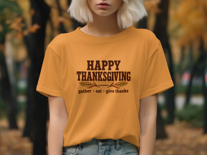 Orange t-shirt with "Happy Thanksgiving" text and wheat accents.