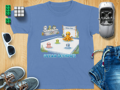 T-shirt with cartoon octopuses playing water polo and "Ocean Olympics" text.
