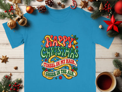 Blue t-shirt with "Happy Christmas" text, plus "Tinsel in my hair, Cheer in the air."