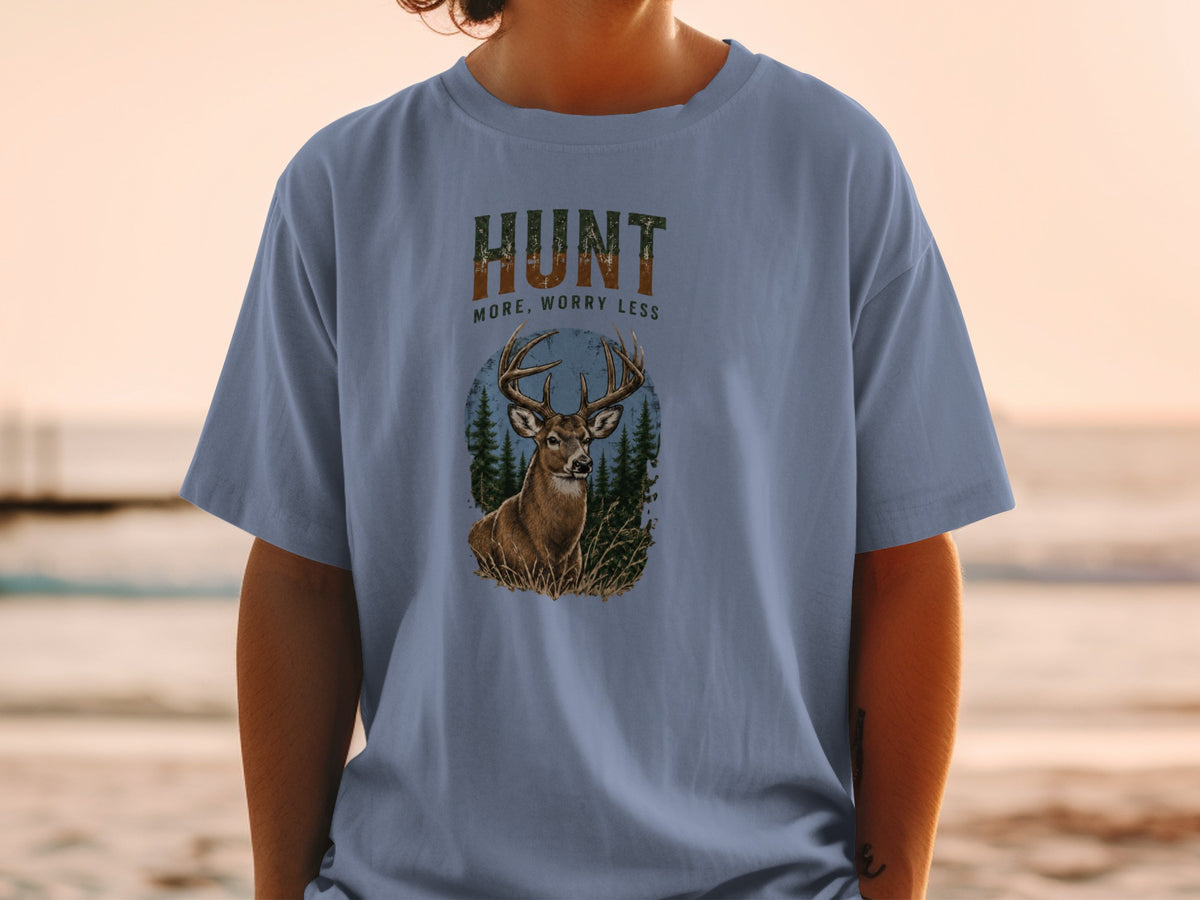 Blue t-shirt with deer graphic and text "HUNT MORE, WORRY LESS".