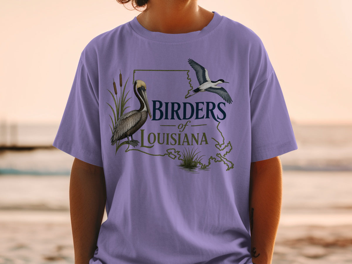 T-shirt with "Birders of Louisiana" text, a pelican, and a flying bird.