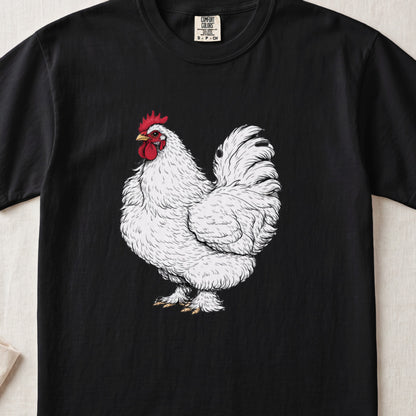 A black t-shirt featuring a detailed illustration of a white rooster on the front.