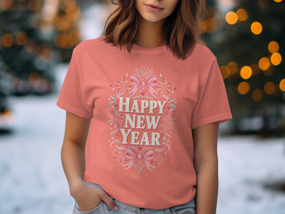 Coral t-shirt with "Happy New Year" text surrounded by fireworks and ribbons.
