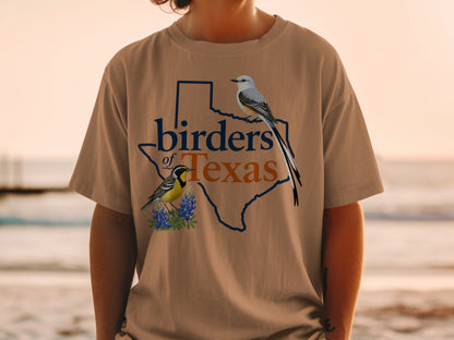 Birders of Texas graphic on a tan t-shirt with two birds and bluebonnets.
