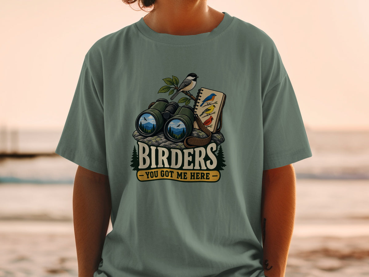 Birdwatching graphic with binoculars, birds, and text "BIRDERS - YOU GOT ME HERE".