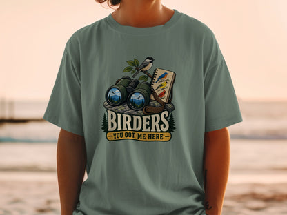 Birdwatching graphic with binoculars, birds, and text "BIRDERS - YOU GOT ME HERE".