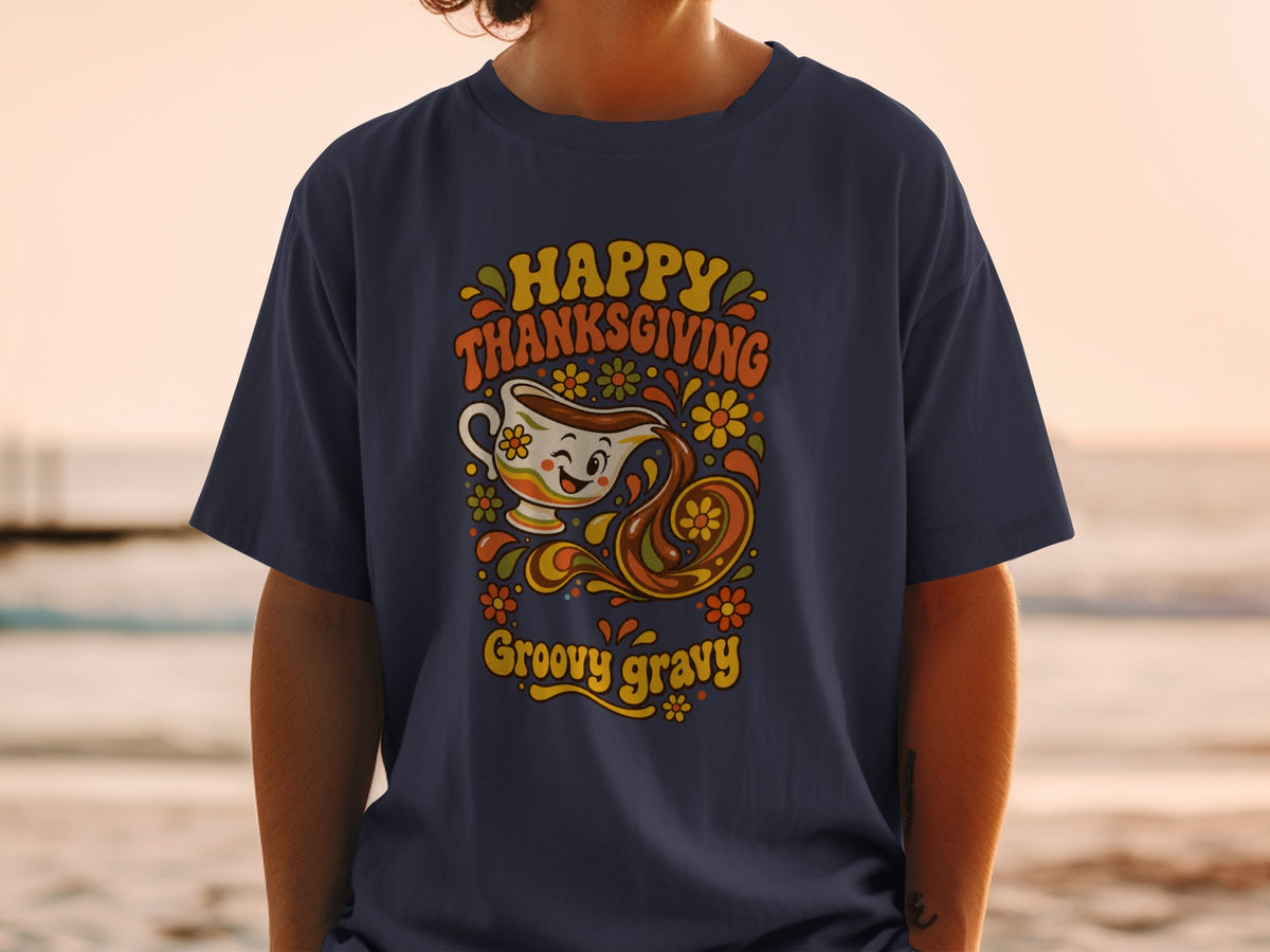 Dark blue t-shirt with "Happy Thanksgiving Groovy Gravy" text and gravy boat graphic.