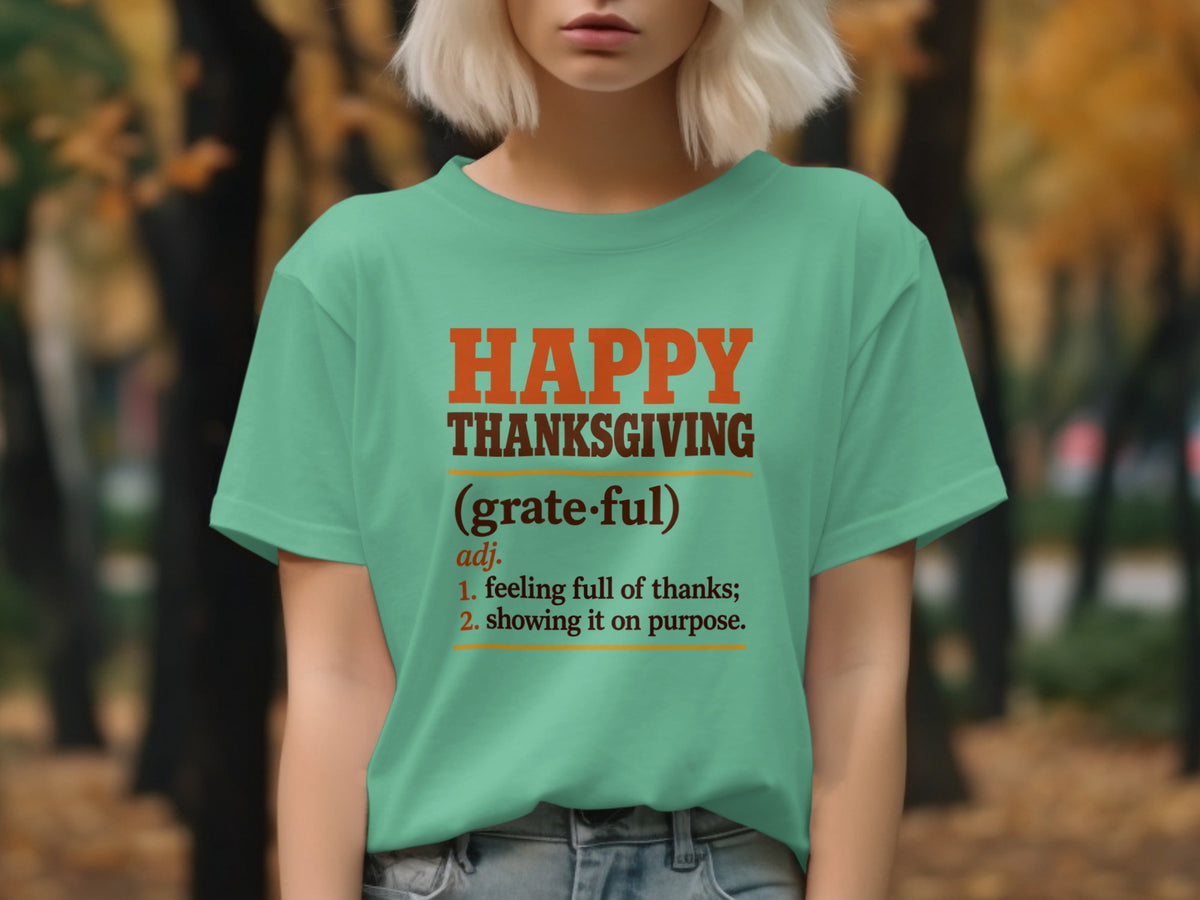 Teal t-shirt with "Happy Thanksgiving" definition in orange and brown text.