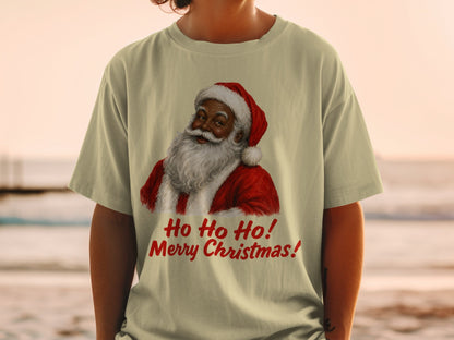 Santa Claus graphic with "Ho Ho Ho! Merry Christmas!" text on a beige t-shirt.