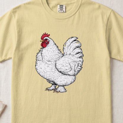 Pale yellow t-shirt featuring a detailed black and white illustration of a white rooster with a red comb.
