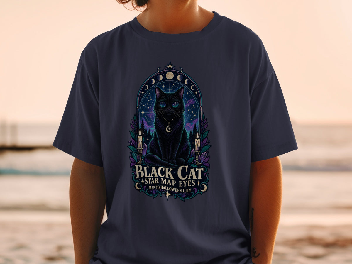 T-shirt graphic featuring a black cat with starry eyes and text.
