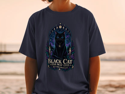 T-shirt graphic featuring a black cat with starry eyes and text.