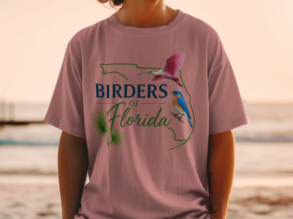 T-shirt graphic with roseate spoonbill and bluebird on Florida outline.