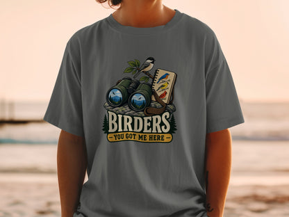 Binoculars and bird illustrations with text "BIRDERS - YOU GOT ME HERE".