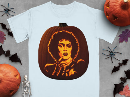 A light blue t-shirt printed with a carved pumpkin graphic of Frank-N-Furter, surrounded by Halloween decorations.