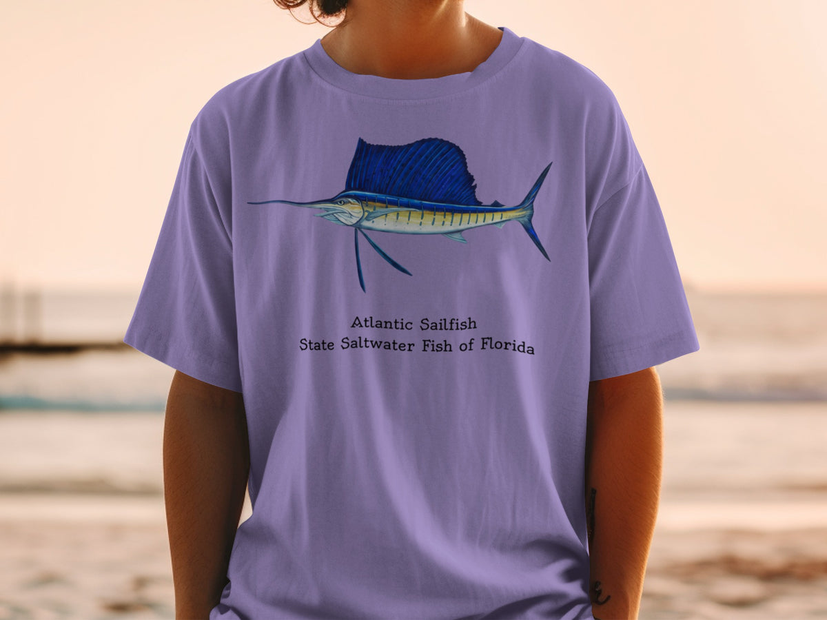 Purple t-shirt with an illustration of an Atlantic Sailfish and text.