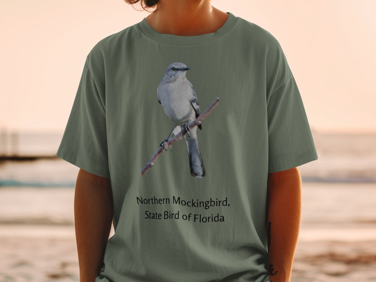 Northern Mockingbird, State Bird of Florida graphic on olive green t-shirt.
