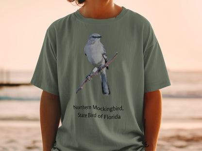 Northern Mockingbird, State Bird of Florida graphic on olive green t-shirt.