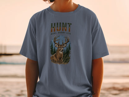 T-shirt with deer graphic and text "HUNT MORE, WORRY LESS"