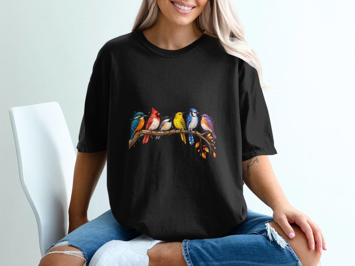 Black t-shirt with colorful birds perched on a branch.