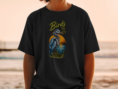 Black t-shirt with "Birds MAKE LIFE BETTER" and a heron at sunset graphic.