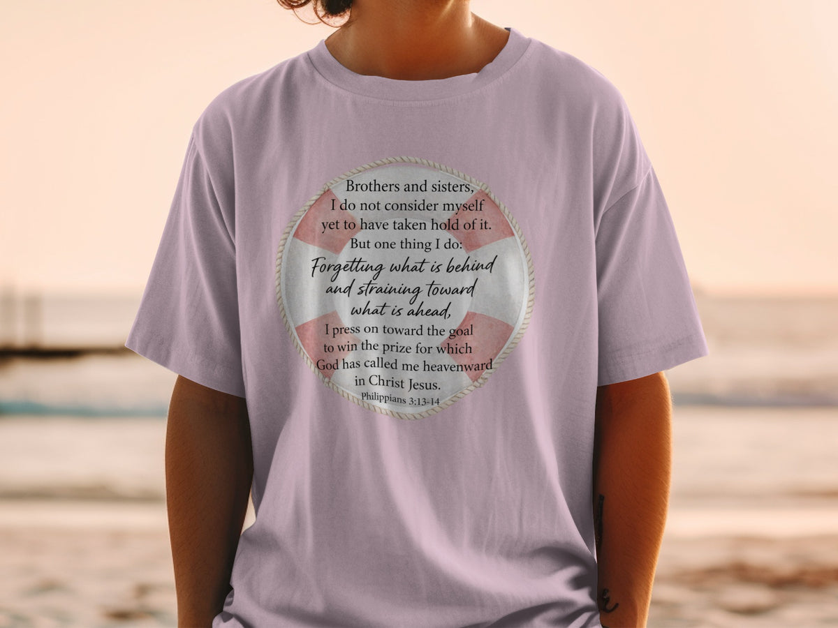 Purple t-shirt with a life preserver graphic containing Bible verse Philippians 3:13-14.