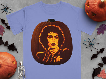 A periwinkle t-shirt featuring a carved pumpkin graphic of Frank-N-Furter, surrounded by Halloween decorations.