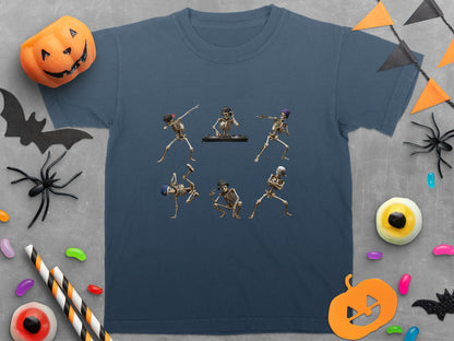 T-shirt with six dancing skeletons, one DJing, on a grey background with Halloween decorations.