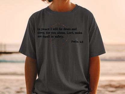 Dark t-shirt with text "In peace I will lie down and sleep, for you alone, Lord, make me dwell in safety. Psalm 4:8"
