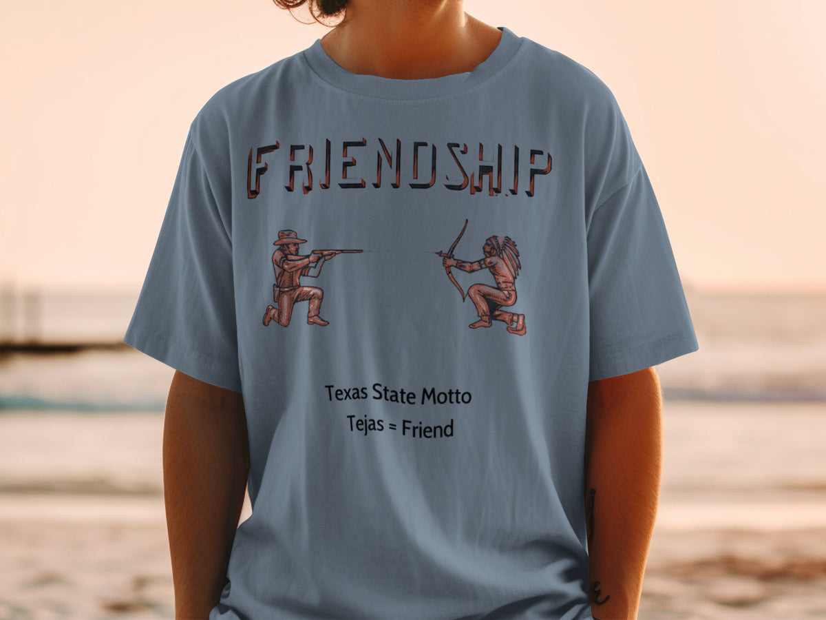 Blue t-shirt with "FRIENDSHIP" and illustration of a cowboy and Native American, Texas motto.