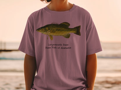 Largemouth Bass, State Fish of Alabama graphic on a mauve t-shirt.