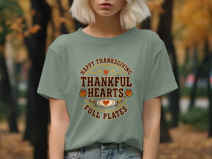 T-shirt with "Happy Thanksgiving Thankful Hearts Full Plates" text and autumnal graphics.