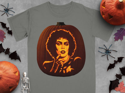 A grey t-shirt featuring a jack-o-lantern carved with a portrait of Frank-N-Furter, surrounded by Halloween decorations.