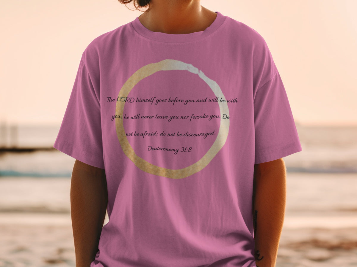 Pink t-shirt with Bible verse "The LORD himself goes before you..." from Deuteronomy 31:8.