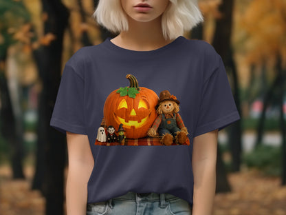 T-shirt with jack-o'-lantern, scarecrow, ghost, vampire, and witch figures on plaid blanket.