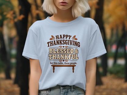 Light blue t-shirt with text: "Happy Thanksgiving Blessed & Thankful for this table, these people."