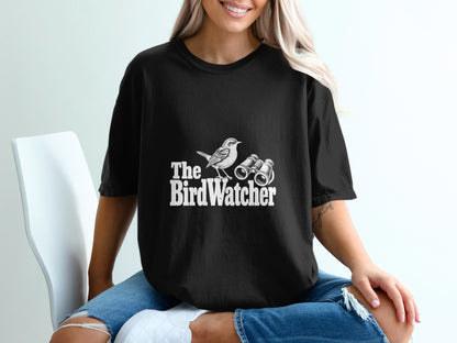 Black t-shirt with white text "The BirdWatcher" featuring a bird and binoculars illustration.