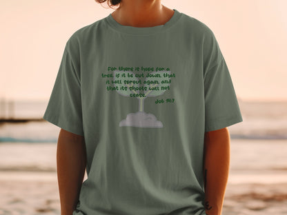 Green t-shirt with text from Job 14:7 and a sprout illustration.